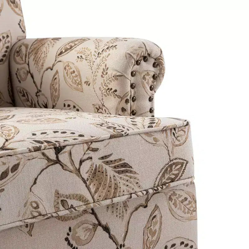 Fauteuil à accoudoirs pleins et dossier en forme de bosse de chameau Yahweh en bois de transition, avec garniture en tissu à motifs floraux | ART OF LIVING DES