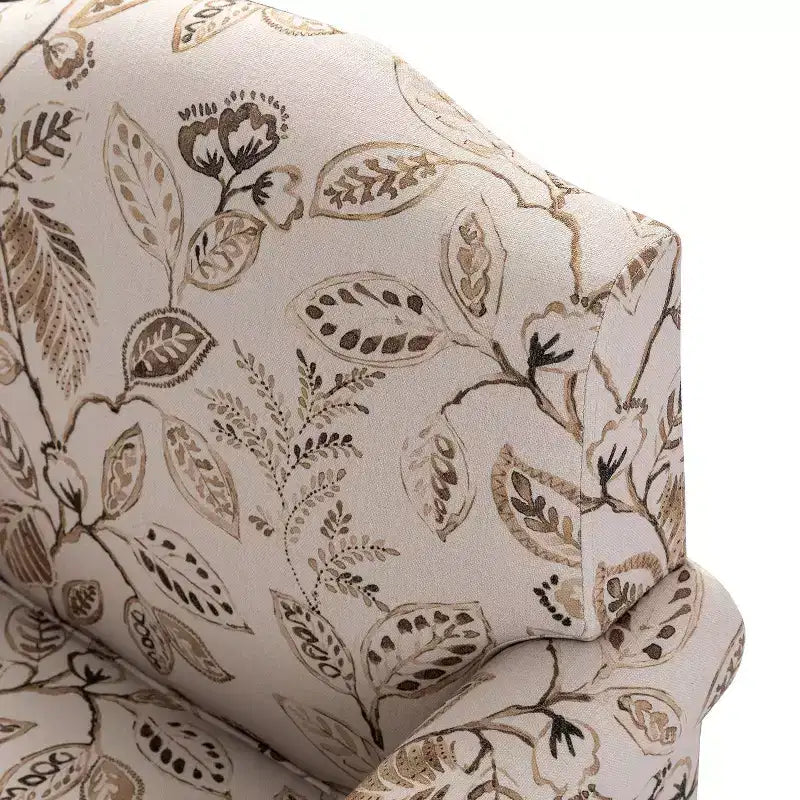 Fauteuil à accoudoirs pleins et dossier en forme de bosse de chameau Yahweh en bois de transition, avec garniture en tissu à motifs floraux | ART OF LIVING DES