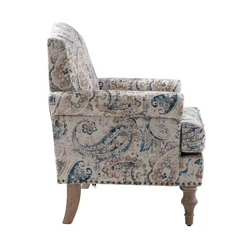 Fauteuil à accoudoirs pleins et dossier en forme de bosse de chameau Yahweh en bois de transition, avec garniture en tissu à motifs floraux | ART OF LIVING DES