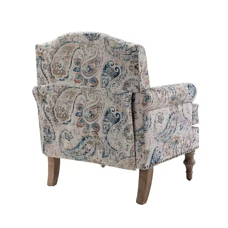 Fauteuil à accoudoirs pleins et dossier en forme de bosse de chameau Yahweh en bois de transition, avec garniture en tissu à motifs floraux | ART OF LIVING DES