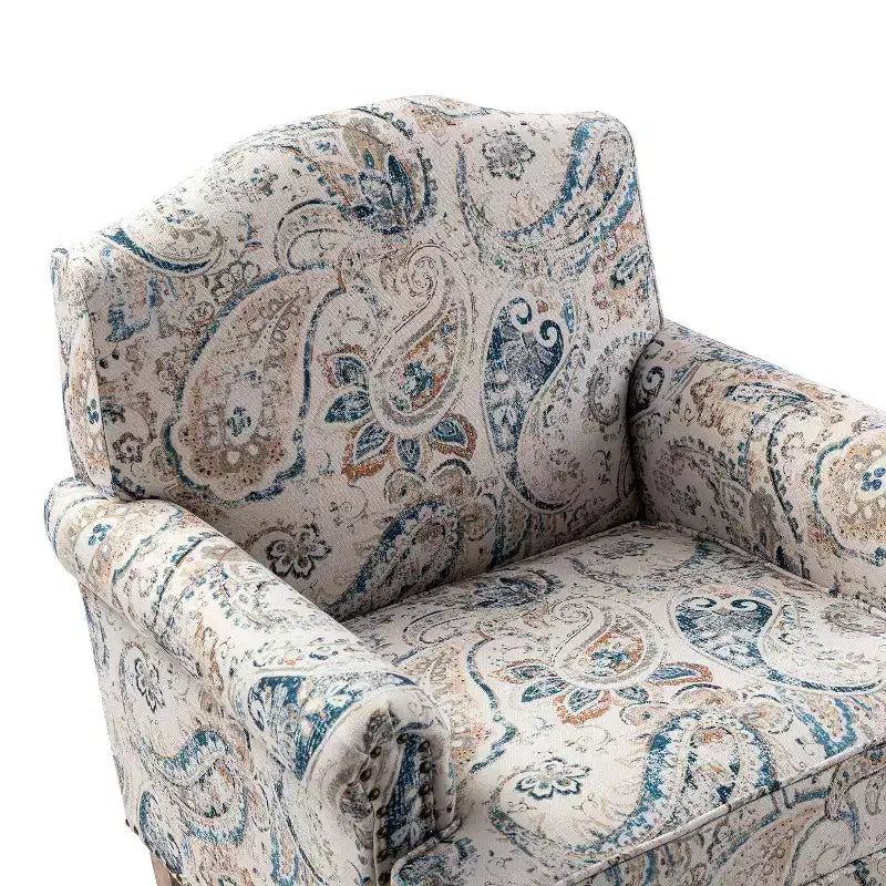 Fauteuil à accoudoirs pleins et dossier en forme de bosse de chameau Yahweh en bois de transition, avec garniture en tissu à motifs floraux | ART OF LIVING DES
