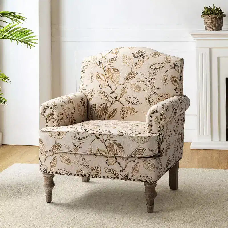 Fauteuil à accoudoirs pleins et dossier en forme de bosse de chameau Yahweh en bois de transition, avec garniture en tissu à motifs floraux | ART OF LIVING DES