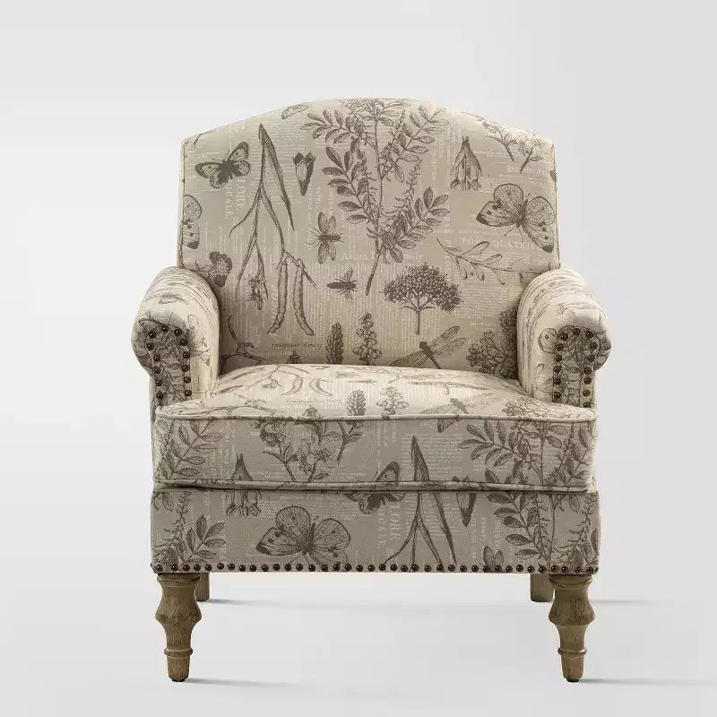 Fauteuil à accoudoirs pleins et dossier en forme de bosse de chameau Yahweh en bois de transition, avec garniture en tissu à motifs floraux | ART OF LIVING DES